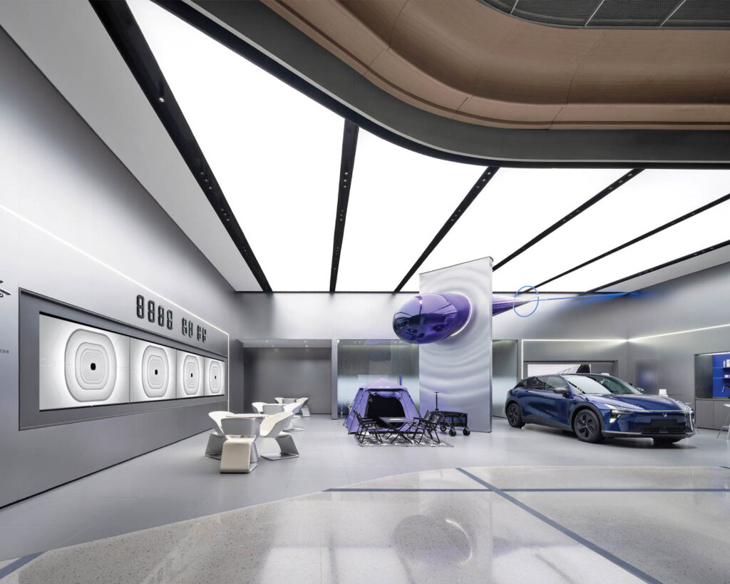 a car showroom with an expansive skylight