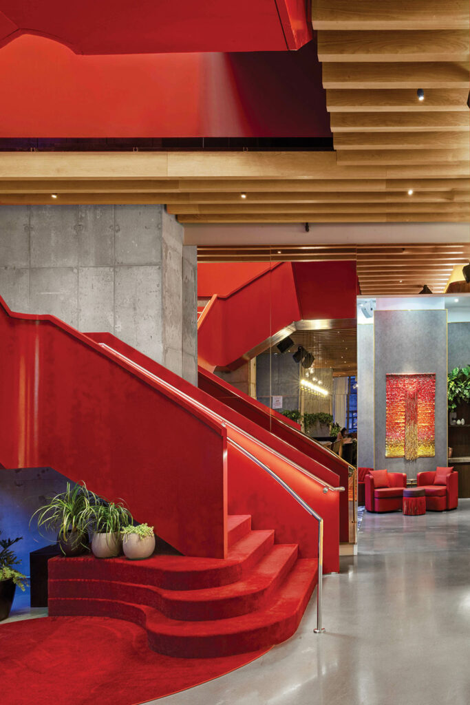 a red staircase in virgin hotels