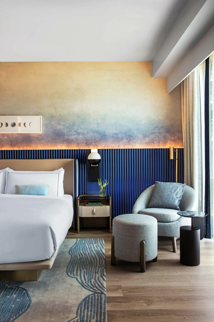 watercolor-esque wallcoverings in a guest room at the Morrow Hotel
