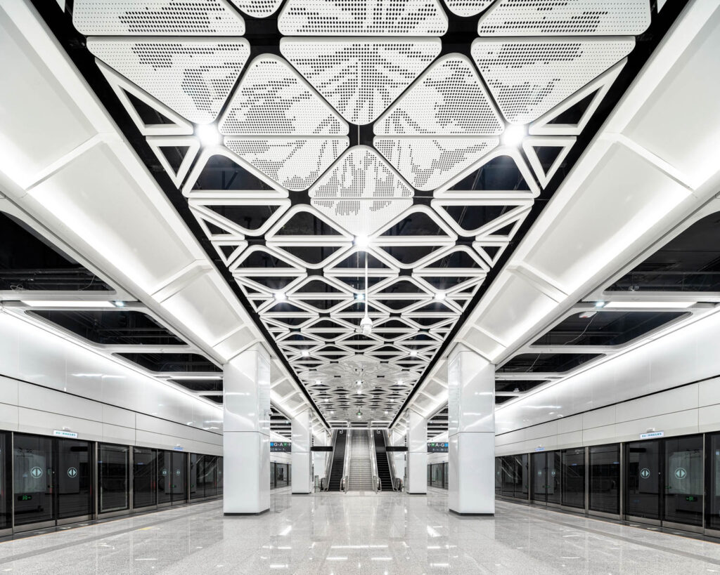 geometric black and white patterns in the metro line ceiling