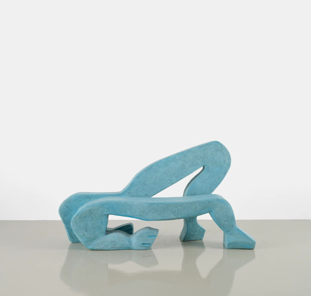 a blue squiggly shaped chair