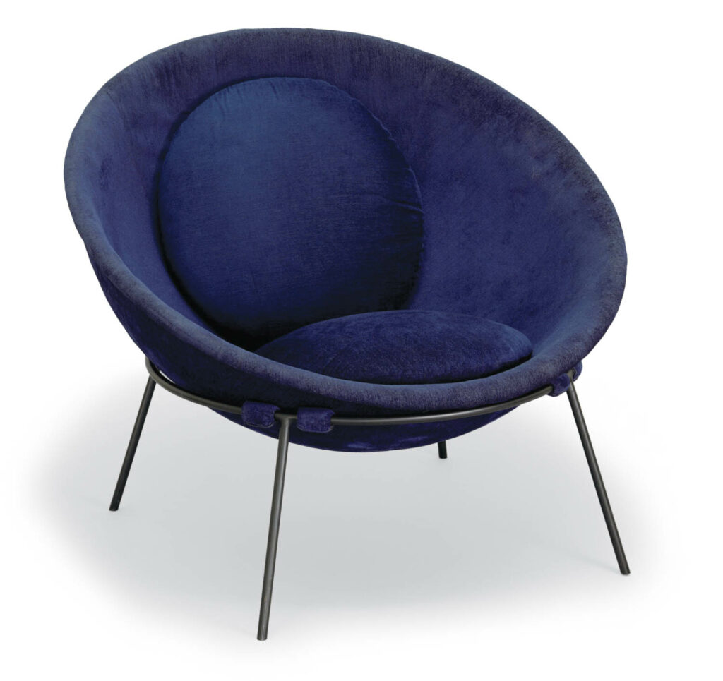 a deep blue bowl chair from 1951