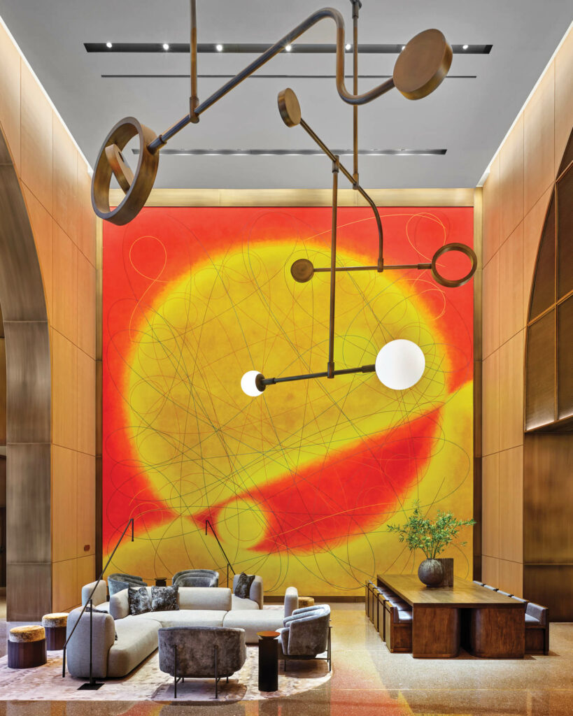 A custom chandelier and an existing Dorothea Rockburne mural from 1993 at 550 Madison in New York