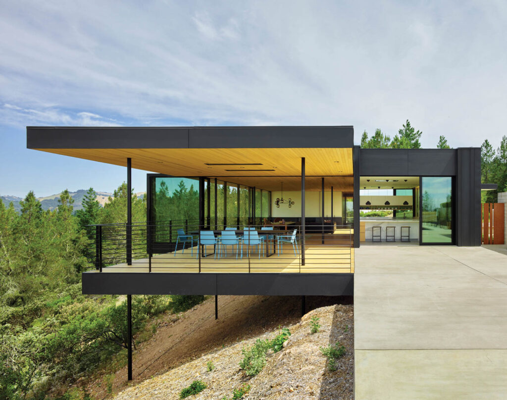a hilltop residence featuring retractable end walls