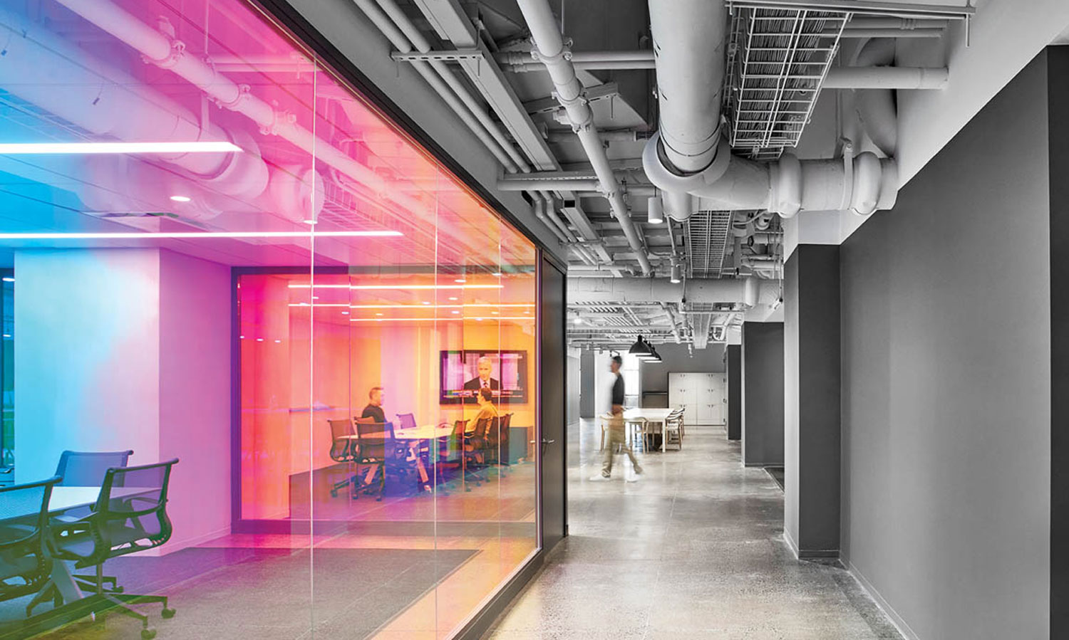 Dichroic glass adding color to the monochrome palette at Verizon’s in-house agency