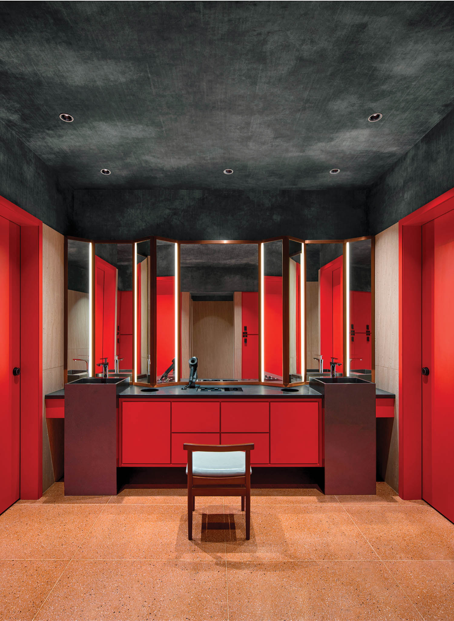 bathroom with red cabinets and doors and black ceiling