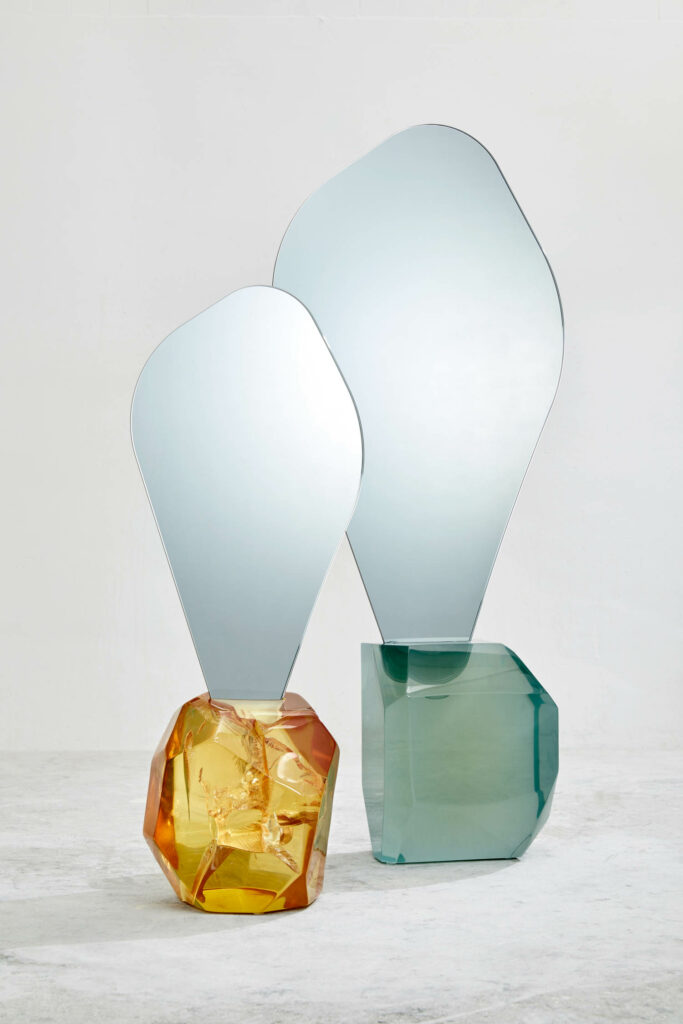 sculptures with white bulbs and crystal base