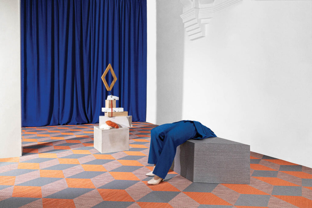 room with blue drapes and orange and blue tiled flooring